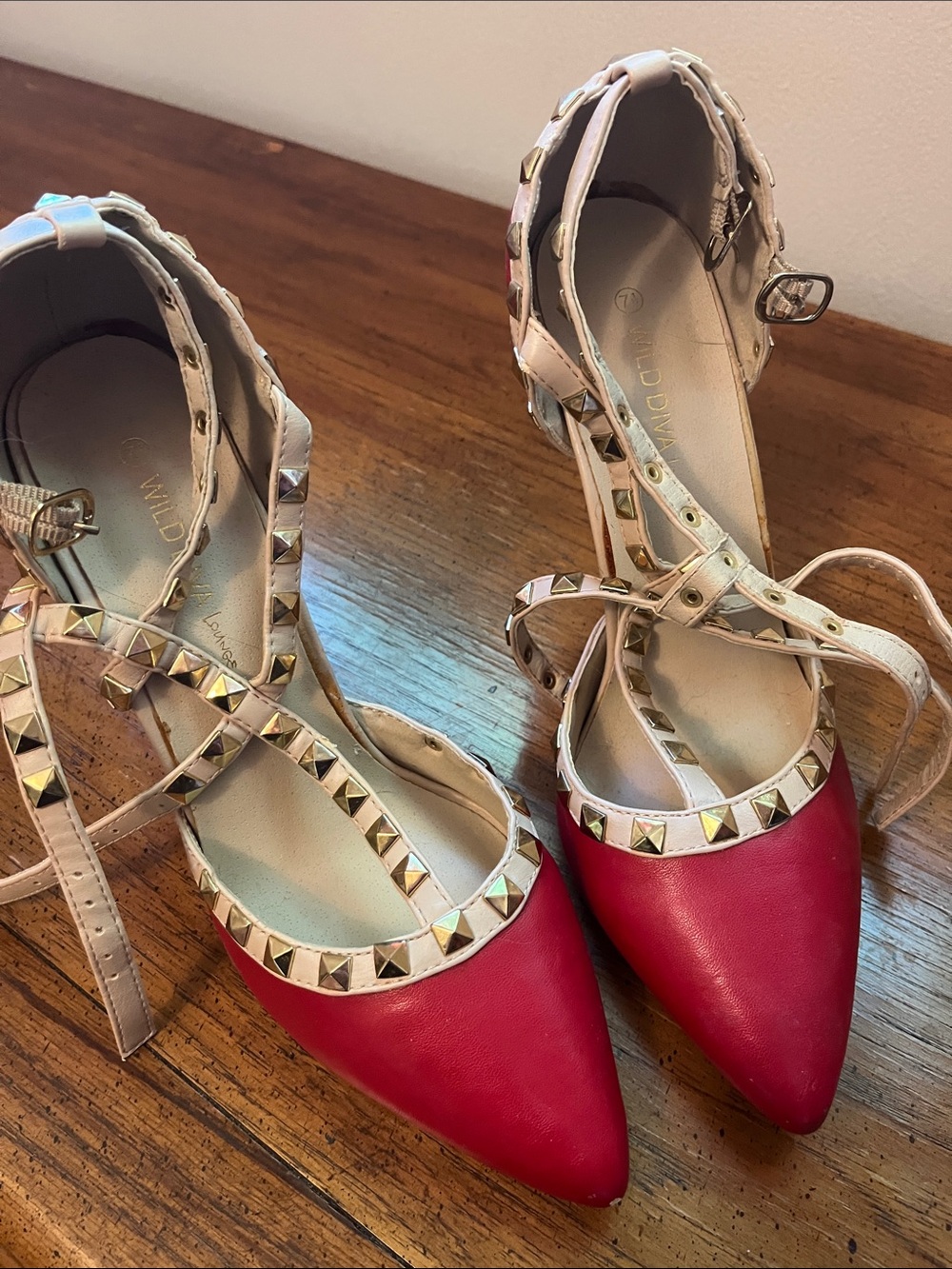Stylish red heels with studded details